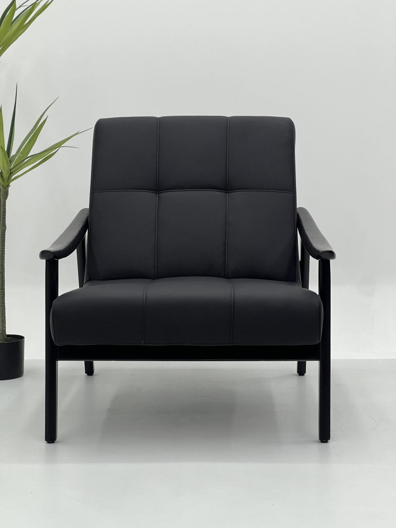 Black Upholstered Lounge Chair with Padded Seat and Armrests