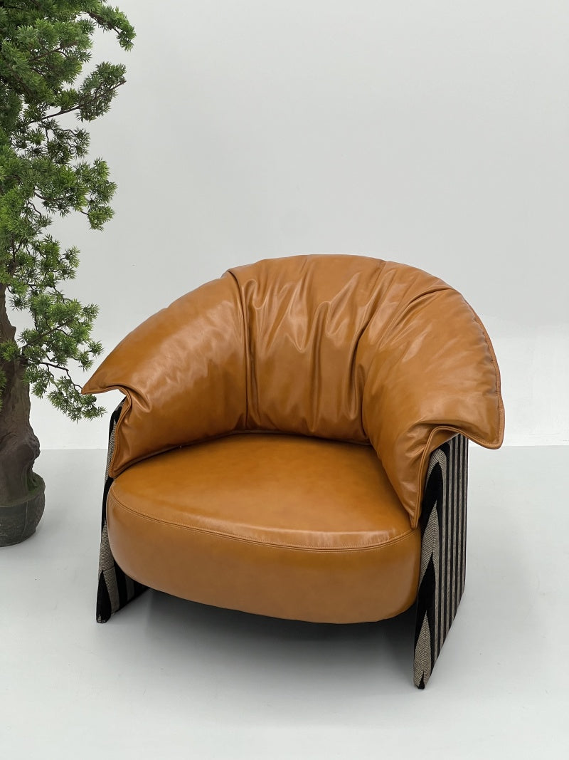 Upholstered Leather Lounge Chair with Sculpted Backrest for Interior Projects