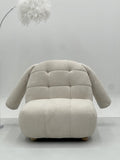 Upholstered Lounge Chair with Quilted Cushioning and Soft Armrest Design