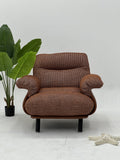 Upholstered Lounge Armchair with Curved Armrests and Solid Base