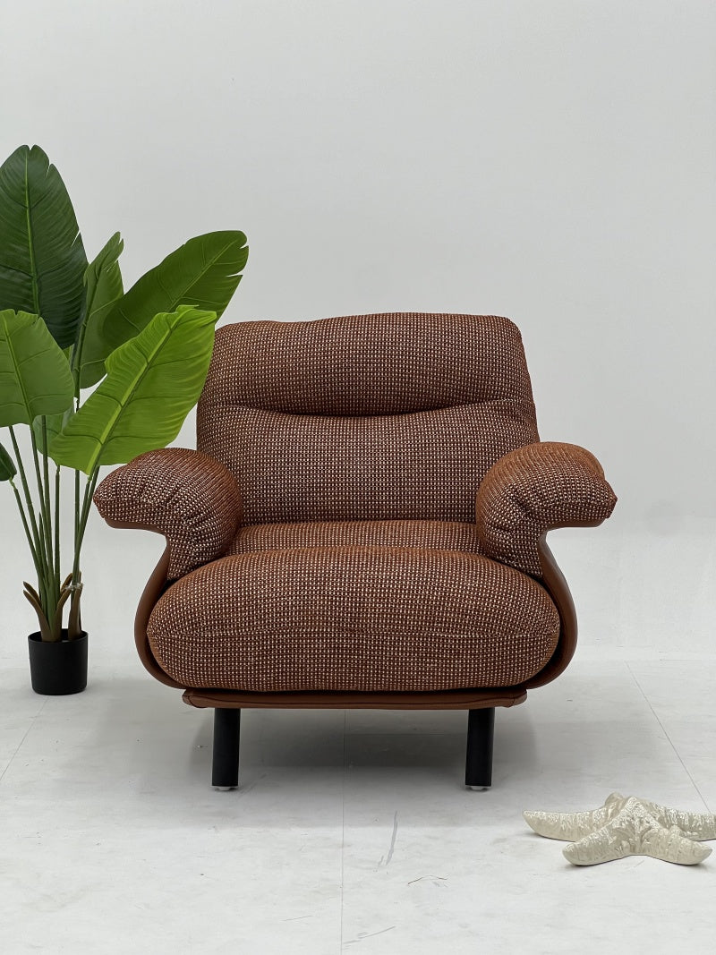 Upholstered Lounge Armchair with Curved Armrests and Solid Base