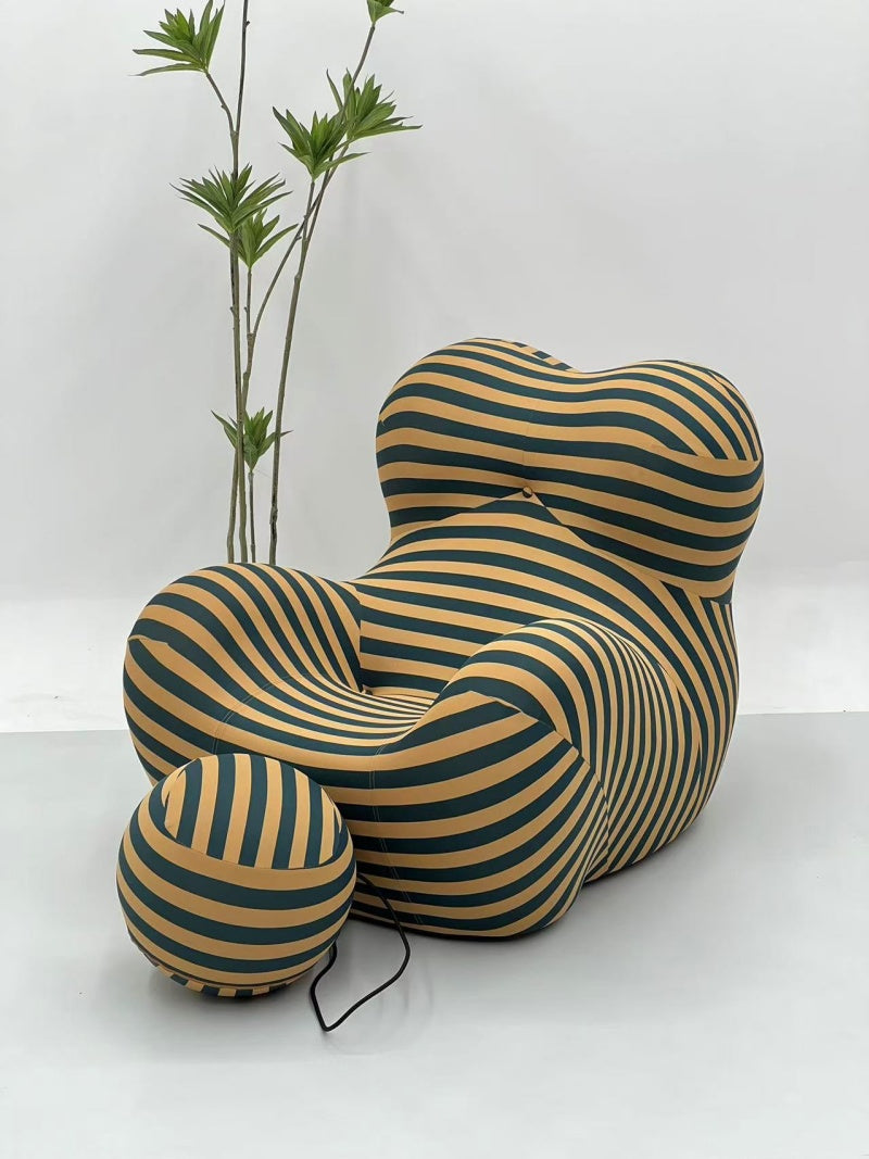Hug Lounge Chair with Enveloping Shape and Blue Yellow Striped Upholstery