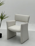 Minimalist Upholstered Armchair with Integrated Backrest and Arm Panels