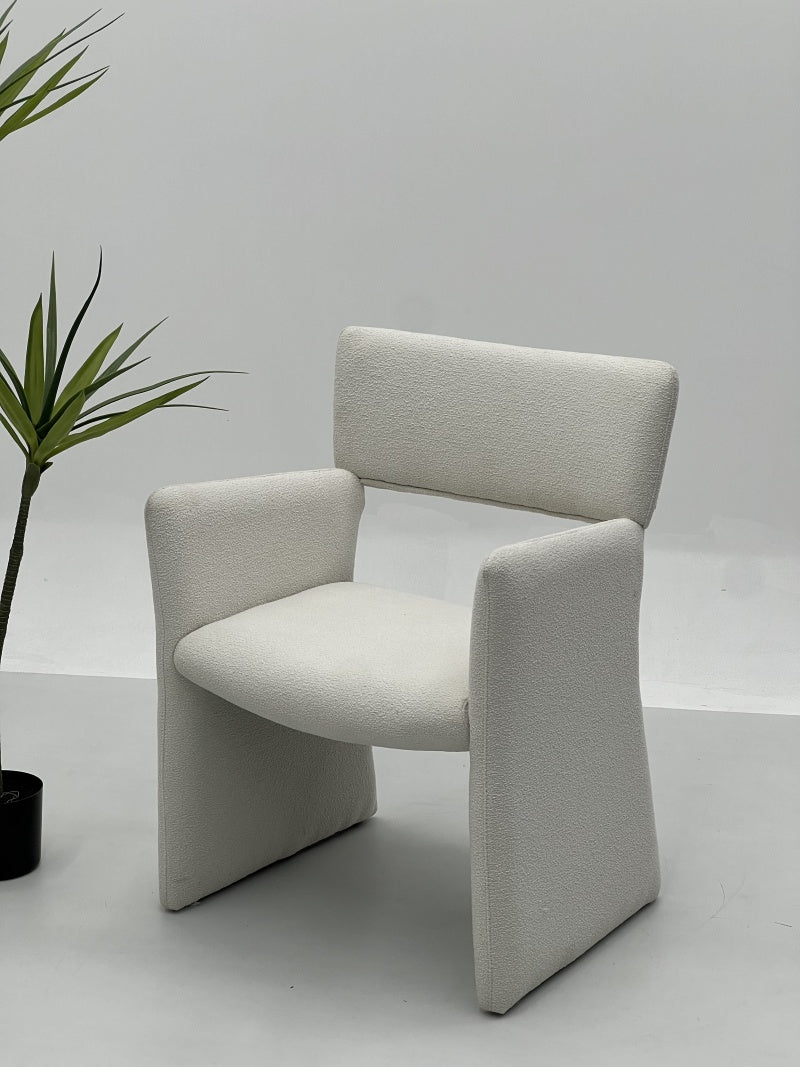 Minimalist Upholstered Armchair with Integrated Backrest and Arm Panels