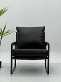 Black Leather Lounge Chair with Black Frame ¨C Minimalist Luxury Accent Seating for Boutique Hotels & Commercial Spaces
