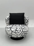 Black White Abstract Swivel Chair with Chrome Base ¨C Bold Artistic Accent Seating for Boutique Hotels & Commercial Lounges