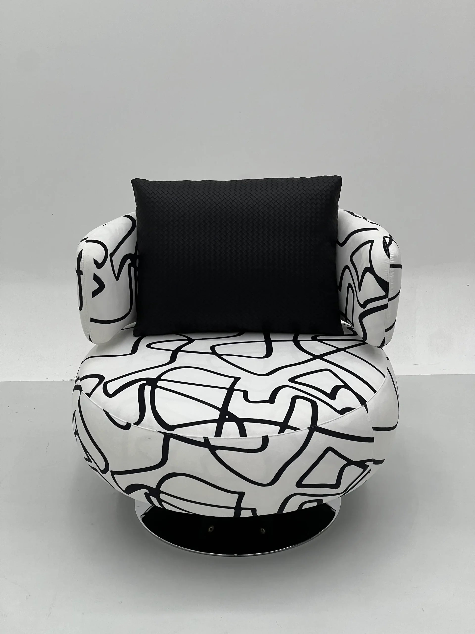 Black White Abstract Swivel Chair with Chrome Base ¨C Bold Artistic Accent Seating for Boutique Hotels & Commercial Lounges