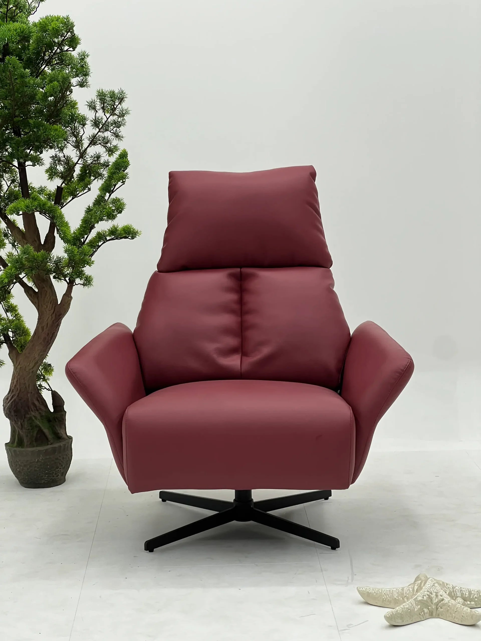 Burgundy Leather Recliner Chair with Black Swivel Base ¨C Luxury Modern Accent Seating for Boutique Hotels & Commercial Lounges