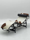 Cowhide Chaise Lounge with Chrome Frame ¨C Luxurious Modern Reclining Seating for Boutique Hotels & Commercial Spaces