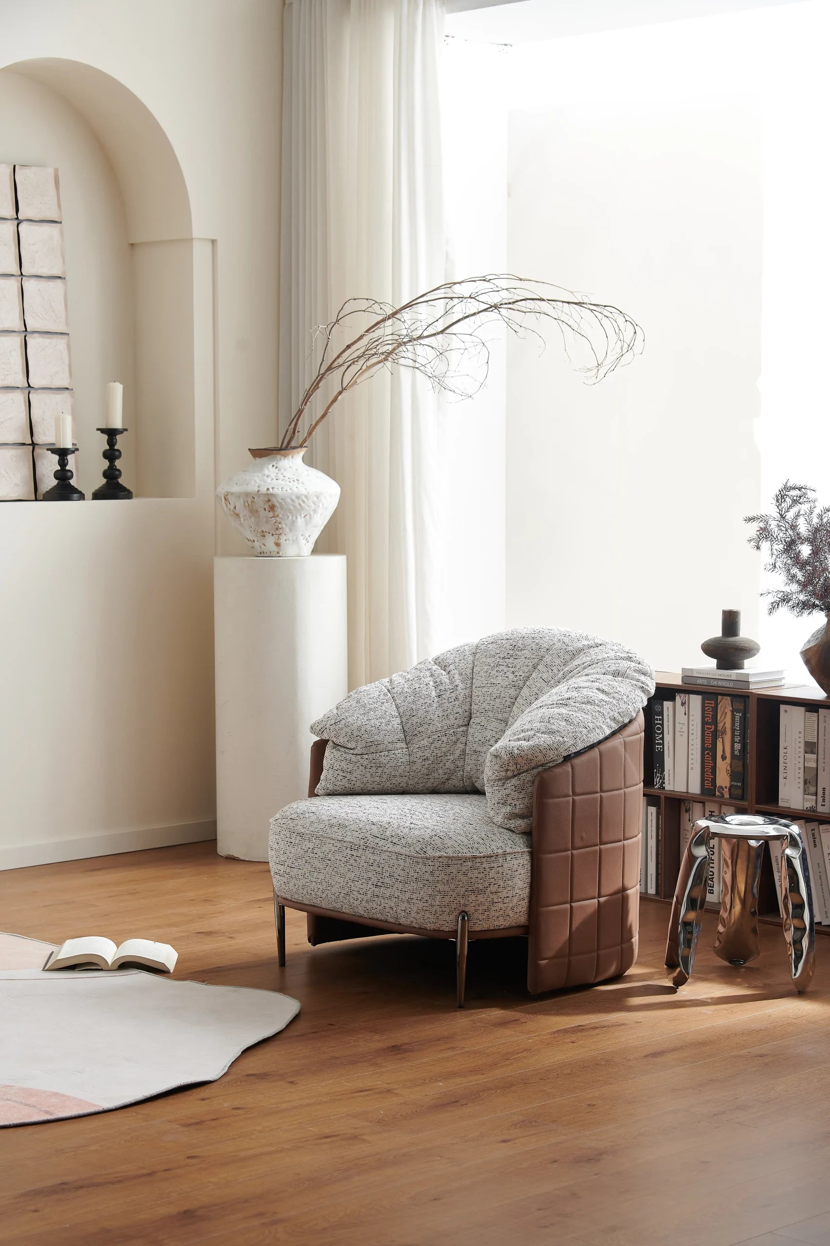 Cream Boucle Curved Lounge Chair with Brown Leather Arms ¨C Luxurious Modern Accent Seating for Boutique Hotels & Commercial Spaces