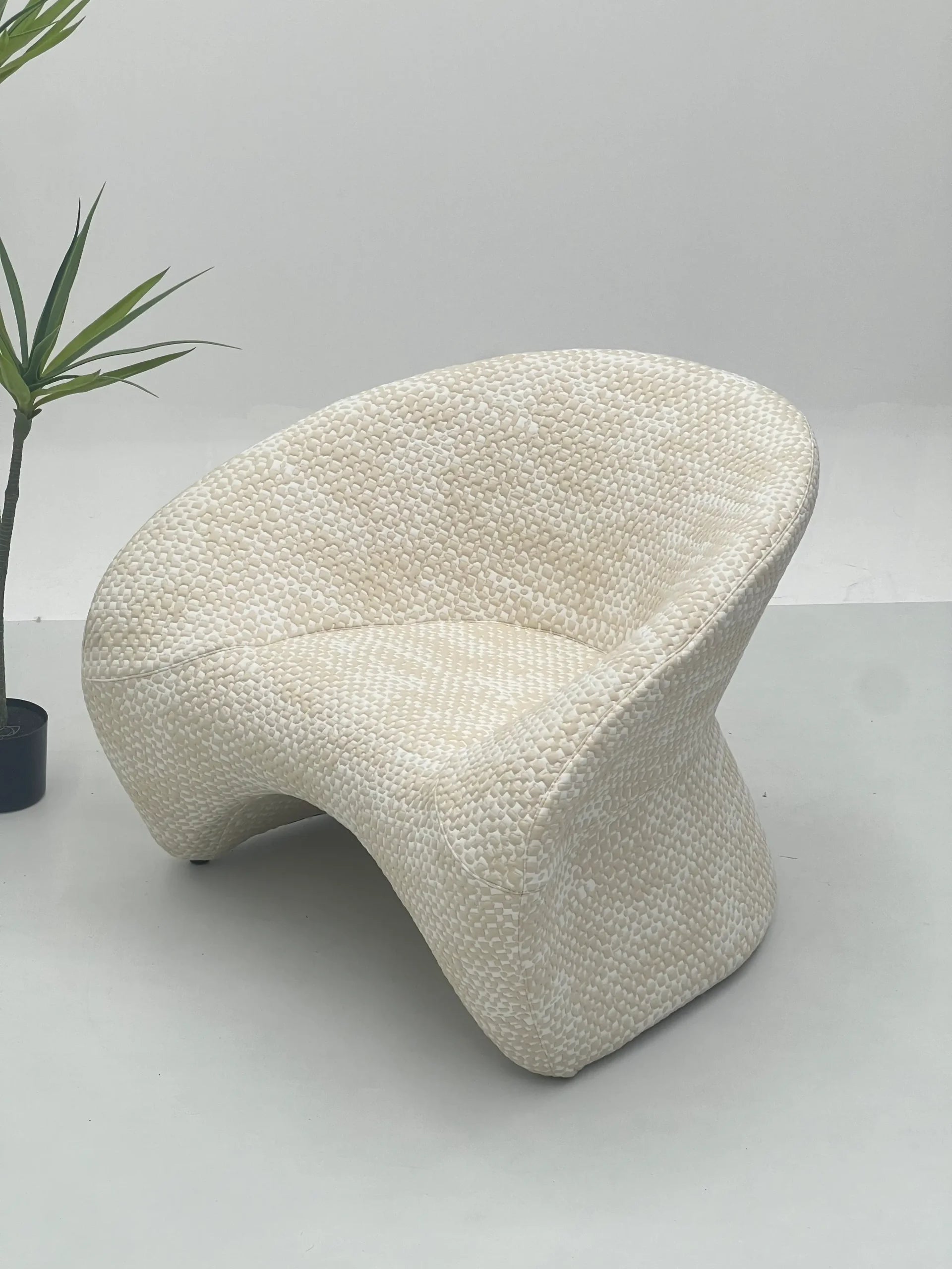 Cream Boucle Sculptural Chair with Oak Legs ¨C Organic Modern Accent Seating for Boutique Hotels & Commercial Spaces