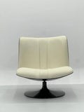 Cream Swivel Lounge Chair with Black Disc Base ¨C Luxurious Modern Accent Seating for Boutique Hotels & Commercial Spaces