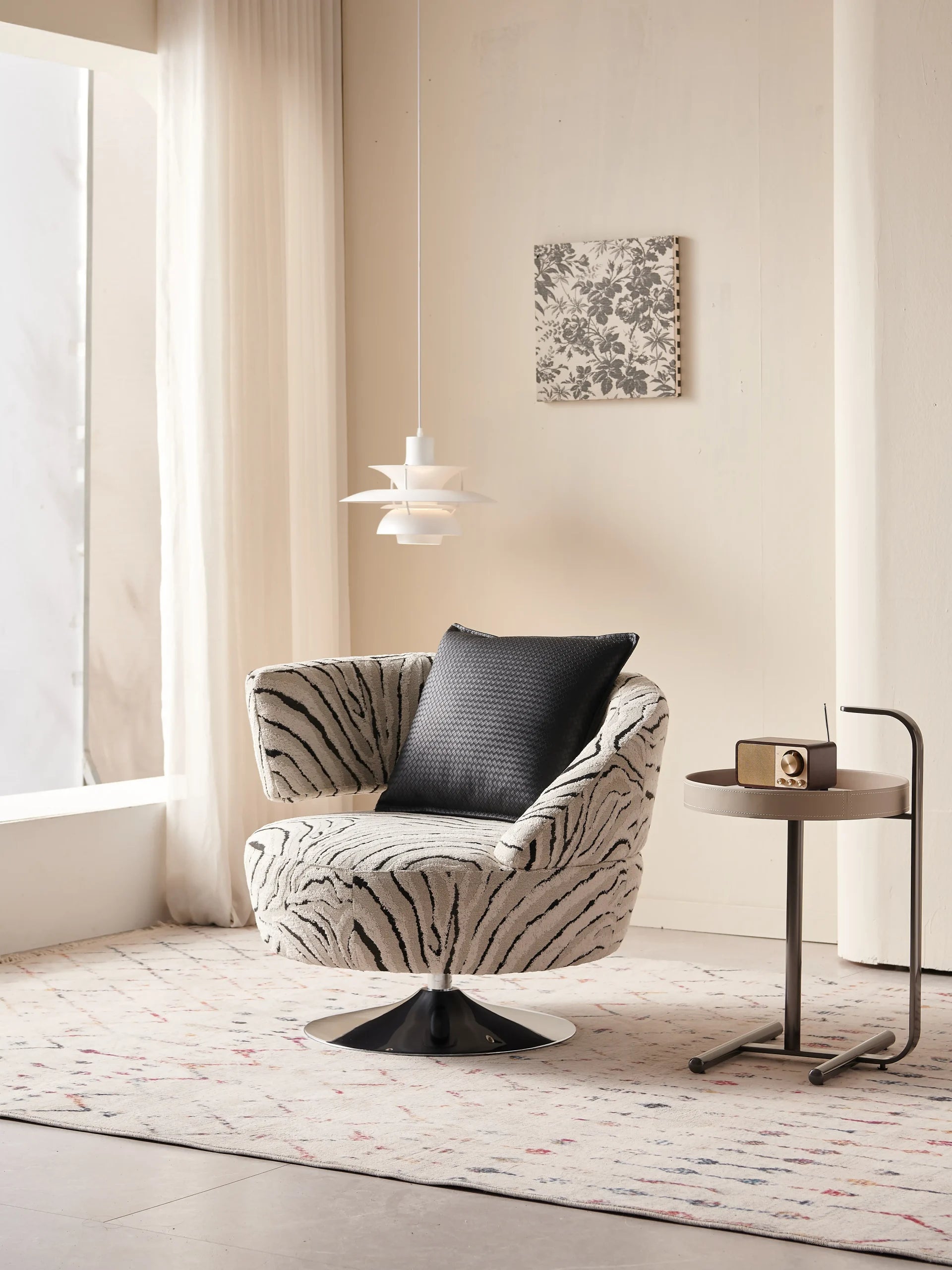 Cream Zebra Print Swivel Chair with Chrome Base ¨C Luxurious Bold Accent Seating for Boutique Hotels & Commercial Lounges