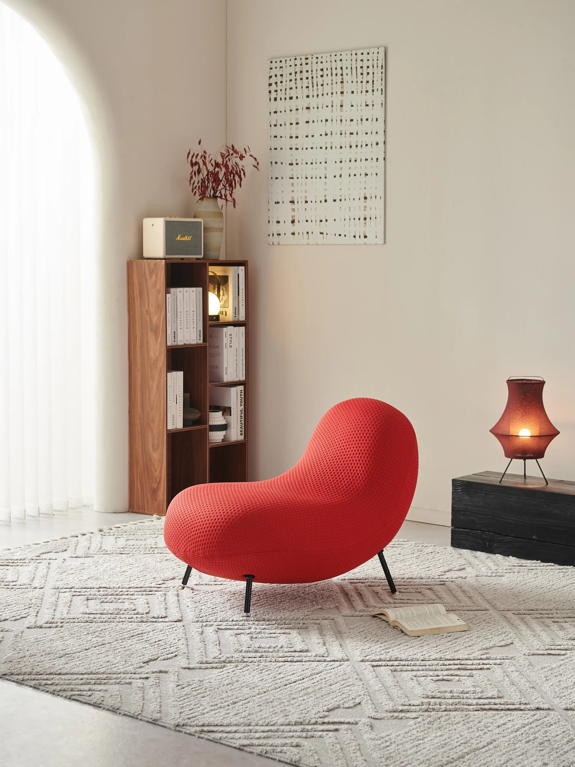 Red Textured Boucle Lounge Chair with Black Tapered Legs ¨C Modern Sculptural Accent Seating for Boutique Hotels & Commercial Lounges