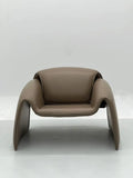 Taupe Leather Lounge Chair with Sculptural Base ¨C Luxurious Modern Accent Seating for Boutique Hotels & Commercial Spaces