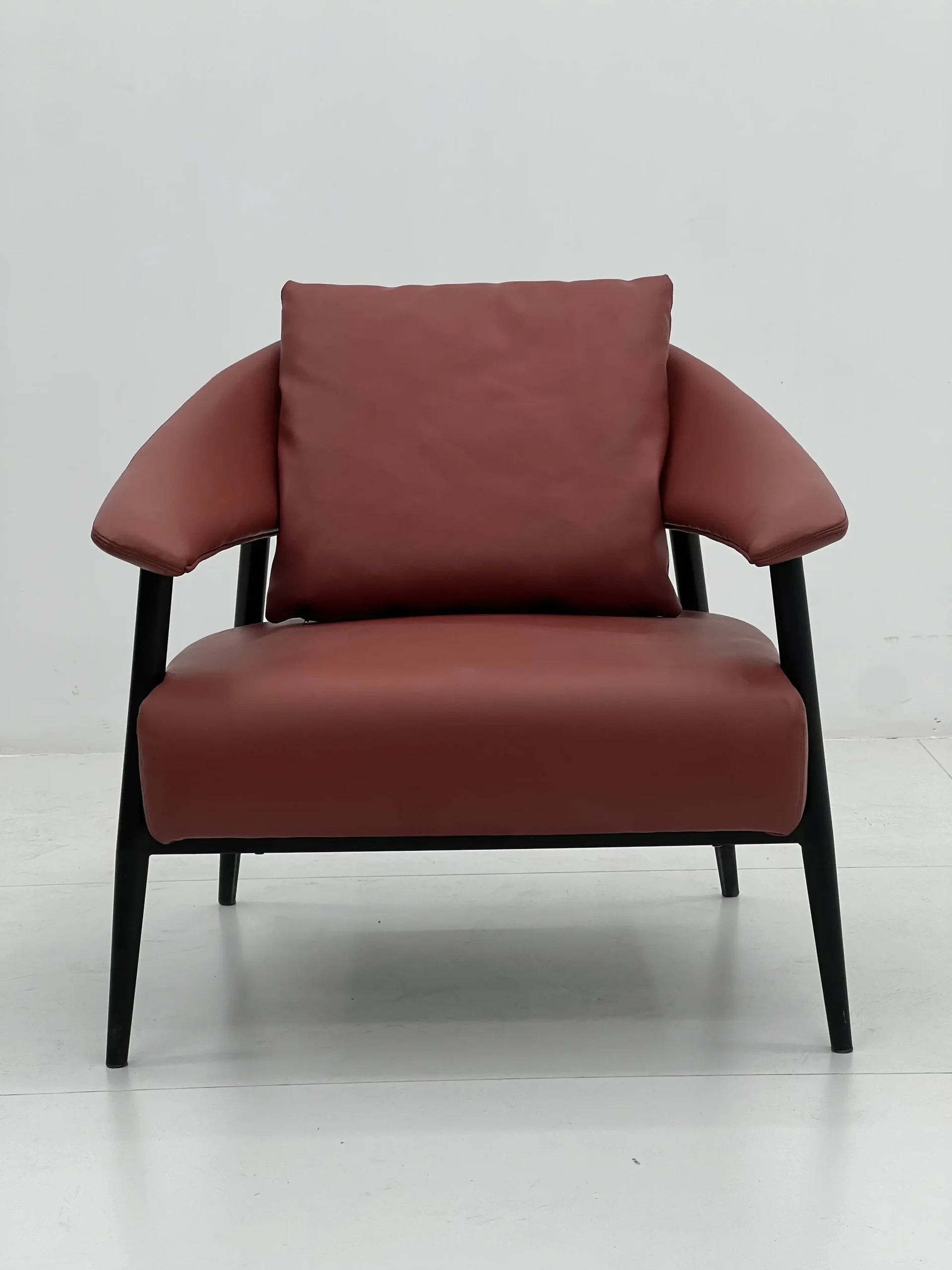 Modern Terracotta Leather Lounge Chair with Black Frame ¨C Plush Contemporary Accent Seating for Commercial Hotels, Offices & Lounges