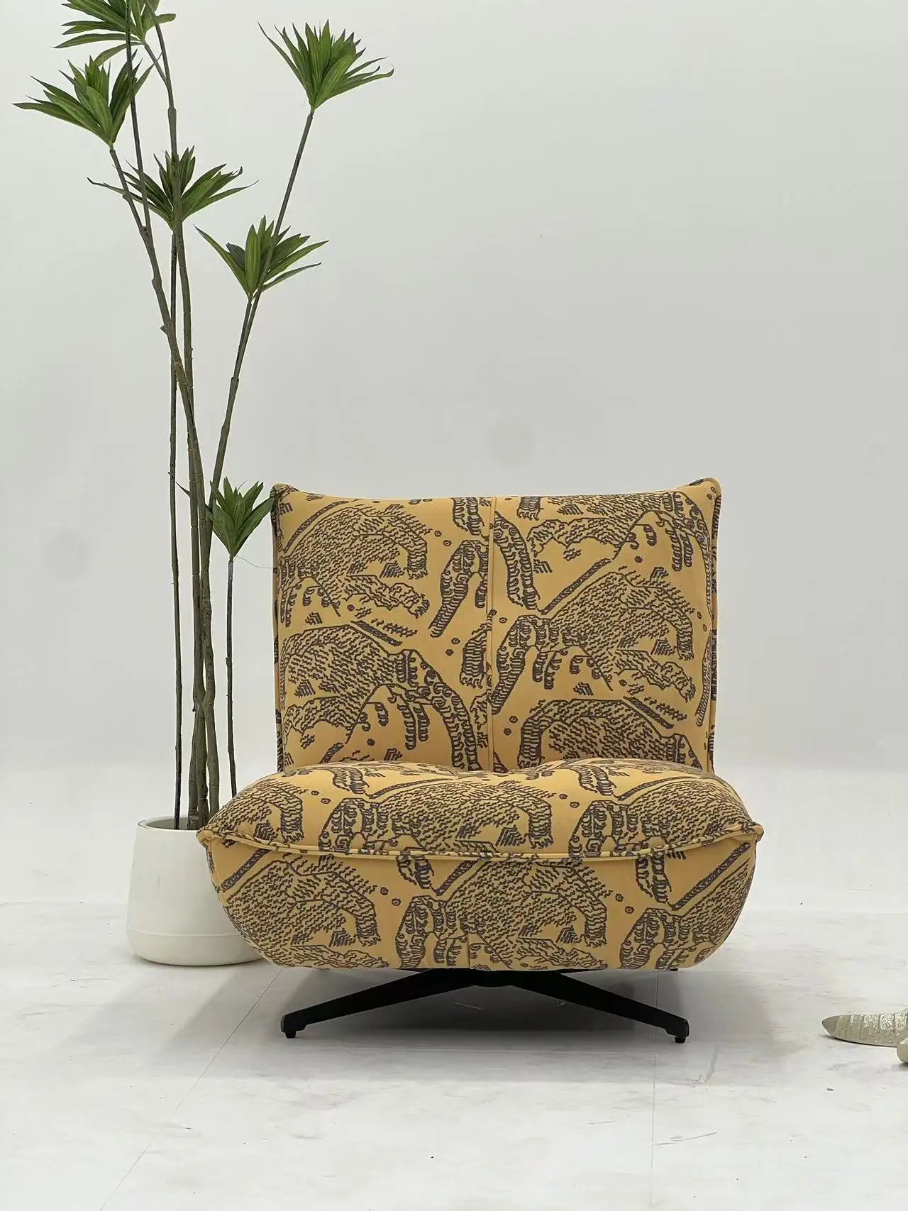 Yellow Animal Print Lounge Chair with Black Swivel Base ¨C Bold Artistic Accent Seating for Boutique Hotels & Commercial Lounges