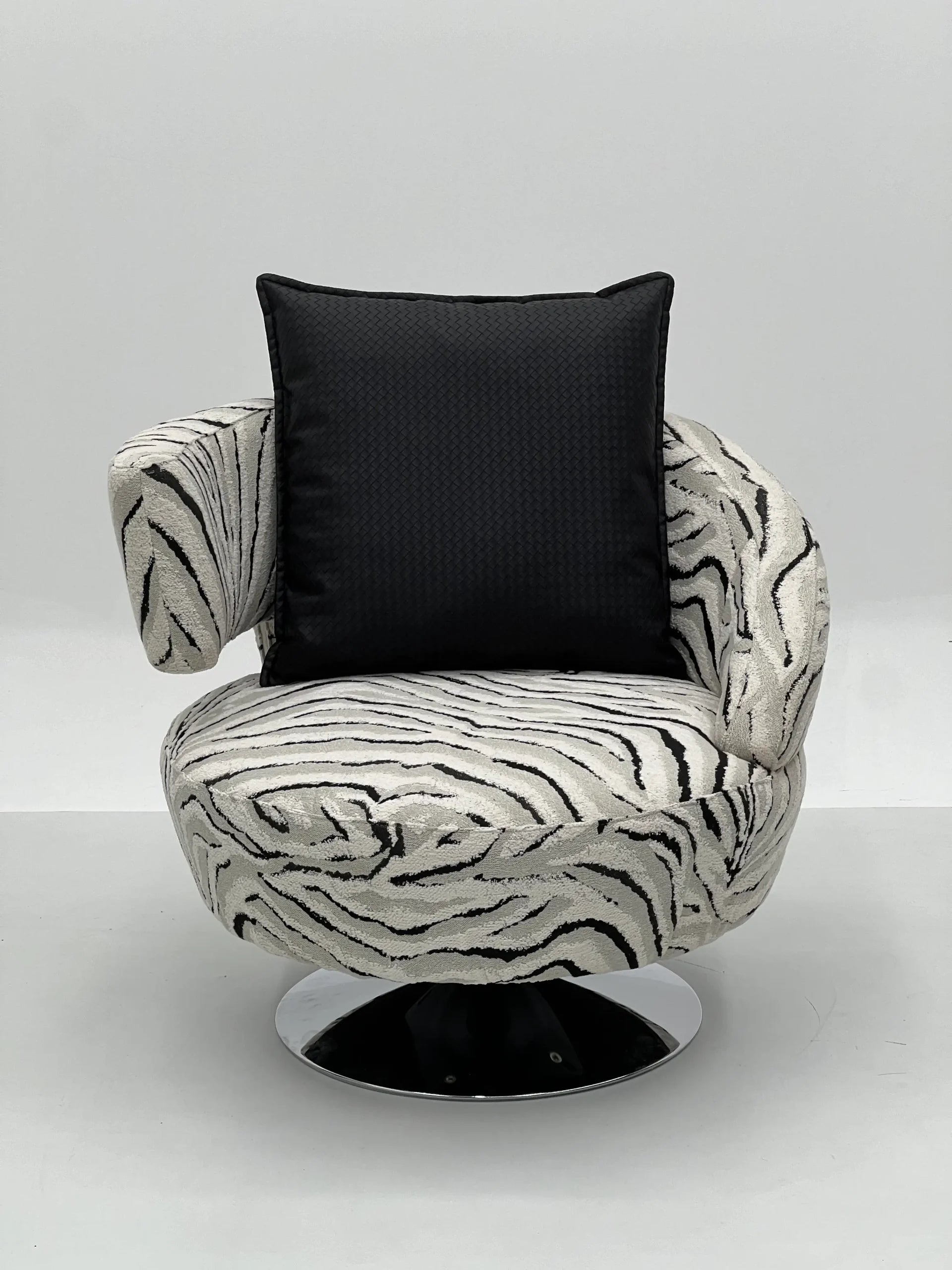 Zebra Print Swivel Lounge Chair with Chrome Base ¨C Bold Luxurious Accent Seating for Boutique Hotels & Commercial Spaces